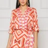 Taking Chances Faux Wrap Romper (Orange Multi)