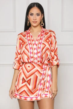 Taking Chances Faux Wrap Romper (Orange Multi)
